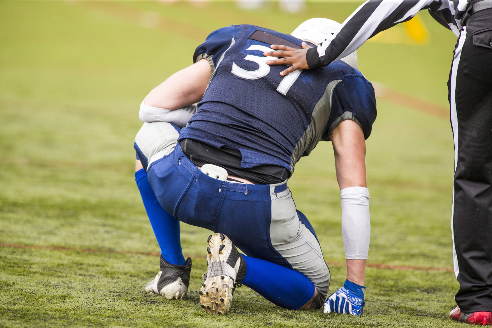 Football playing suffering from testicular pain | Urology Associates | Denver