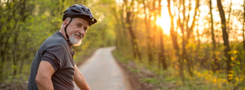 photo ua elder man on bike e Senior man on his mountain bike outdoors after bladder cancer treatment | Urology Associates | Denver, CO